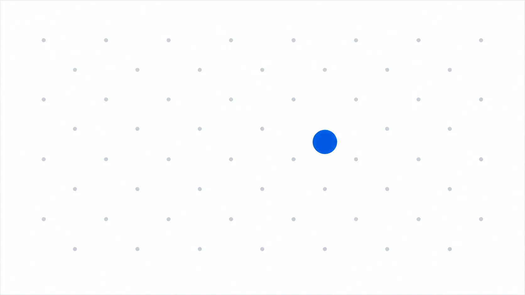 A wide field of faint grey dots with one larger, brighter dot standing out among them
